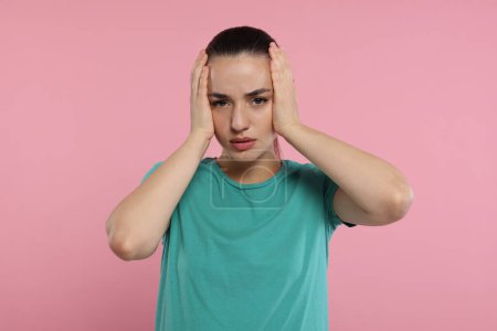 Photo for Resentment. Portrait of upset woman on pink background - Royalty Free Image