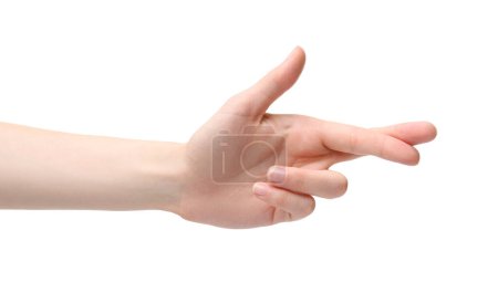 Foto de Mujer cruzando los dedos sobre fondo blanco, primer plano - Imagen libre de derechos