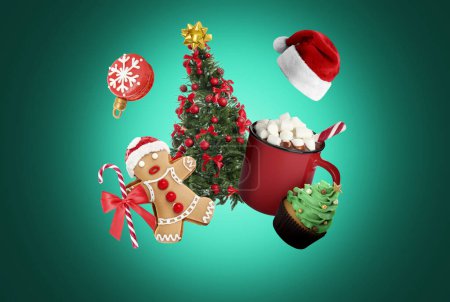 Photo for Christmas celebration. Different festive stuff in air on green gradient background - Royalty Free Image