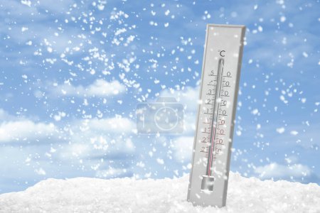 Photo for Weather thermometer under falling snow outdoors on winter day, space for text - Royalty Free Image