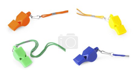 Foto de Diferentes silbatos de colores con cordones aislados en blanco, engastados - Imagen libre de derechos