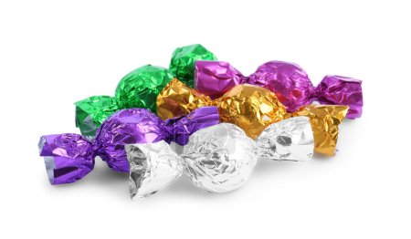 Tasty candies in colorful wrappers isolated on white