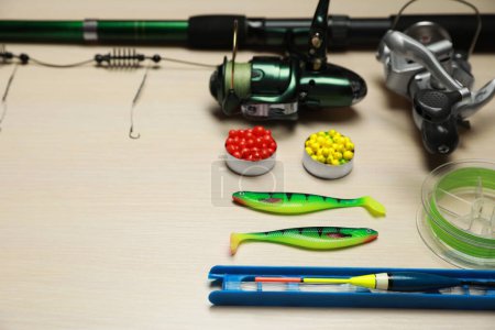 Photo for Fishing tackle on wooden background. Space for text - Royalty Free Image
