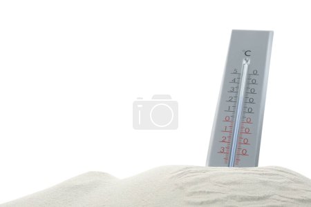 Photo for Weather thermometer in sand against white background - Royalty Free Image