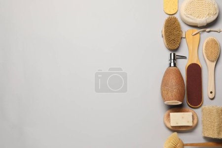 Photo for Bath accessories. Flat lay composition with personal care tools on light grey background, space for text - Royalty Free Image