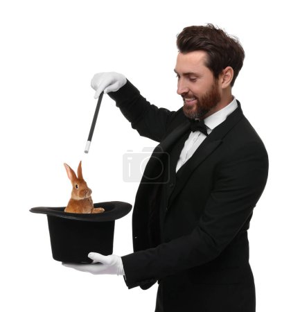 Magician showing trick with top hat and rabbit on white background