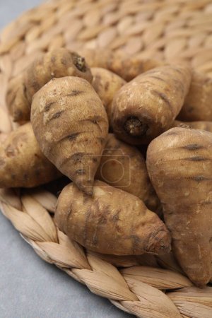 Tubers of turnip rooted chervil on table, closeup