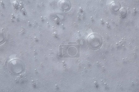 Photo for Clear cosmetic serum on light background, macro view - Royalty Free Image