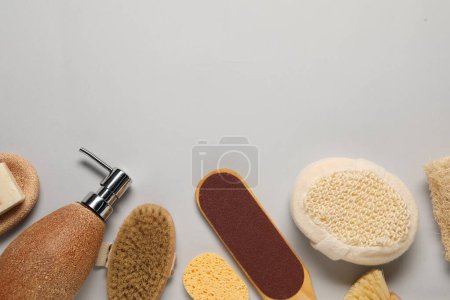 Photo for Bath accessories. Flat lay composition with personal care tools on light grey background, space for text - Royalty Free Image