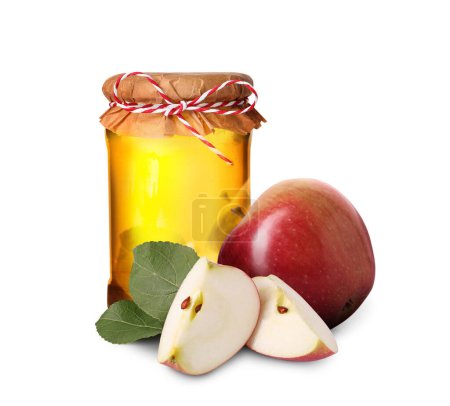 Téléchargez les photos : Miel dans un bocal en verre et pommes isolé sur blanc - en image libre de droit