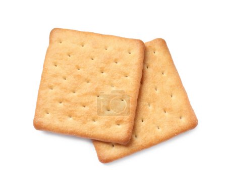 Two crispy crackers isolated on white, top view. Delicious snack