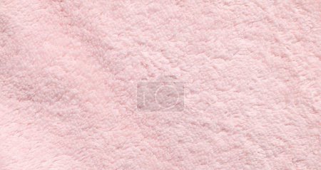 Textur aus weichem rosa Stoff als Hintergrund, Draufsicht