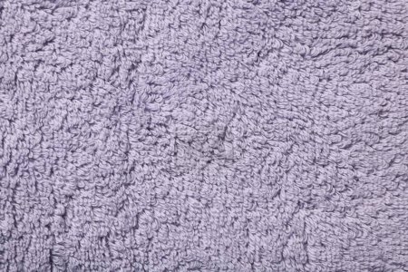 Textur aus weichem violettem Stoff als Hintergrund, Draufsicht
