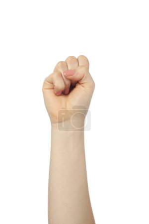 Photo for Playing rock, paper and scissors. Woman showing fist on white background, closeup - Royalty Free Image