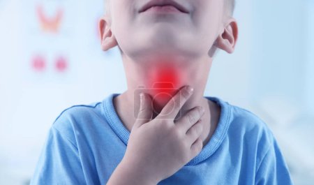 Photo for Endocrine system. Boy doing thyroid self examination indoors, closeup. Banner design - Royalty Free Image