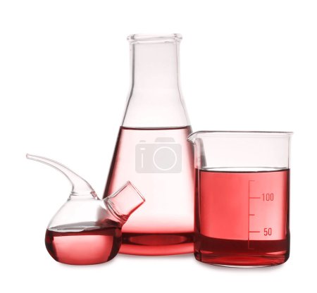 Laboratory glassware with red liquid isolated on white