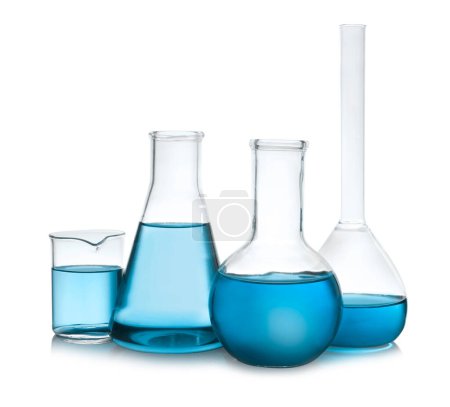Laboratory glassware with blue liquid isolated on white
