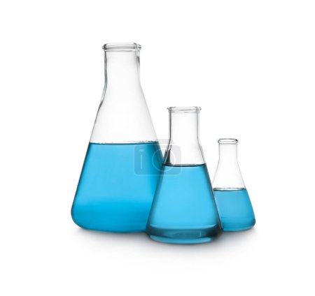 Conical flasks with light blue liquid isolated on white. Laboratory glassware