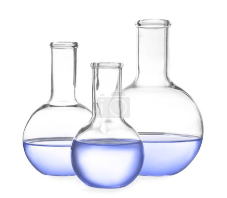 Photo for Boiling flasks with blue liquid isolated on white. Laboratory glassware - Royalty Free Image