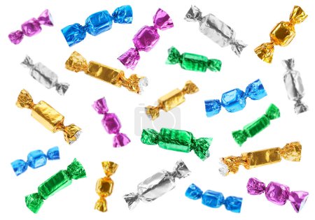 Tasty candies in bright wrappers falling on white background