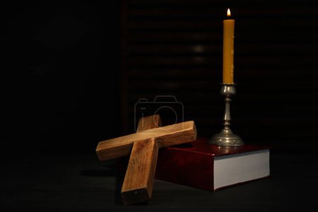 Photo for Church candle, Bible and wooden cross on table, space for text - Royalty Free Image