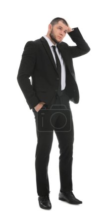 Téléchargez les photos : Homme d'affaires réfléchi en costume sur fond blanc - en image libre de droit