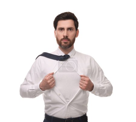 Foto de Hombre de negocios con traje de superhéroe debajo del traje sobre fondo blanco - Imagen libre de derechos