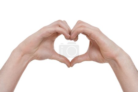Man showing heart gesture with hands on white background, closeup