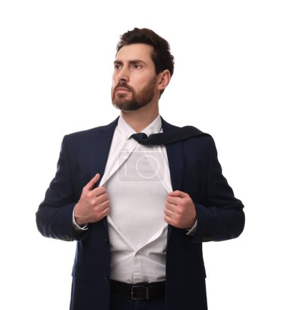 Foto de Hombre de negocios confiado usando traje de superhéroe bajo traje sobre fondo blanco - Imagen libre de derechos