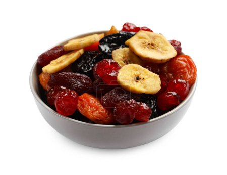 Téléchargez les photos : Mélange de délicieux fruits secs dans un bol isolé sur blanc - en image libre de droit