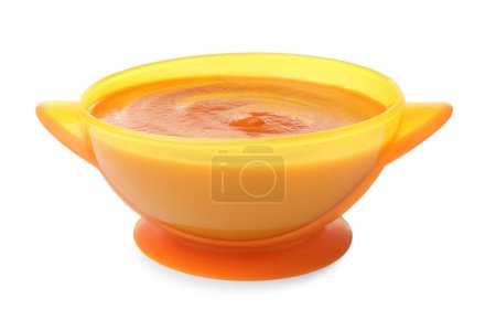 Tasty baby food in bowl isolated on white