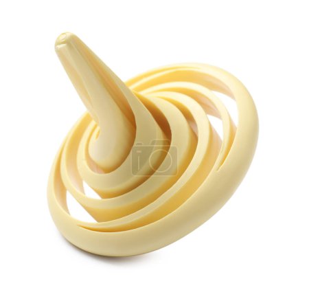 One pale yellow spinning top on white background