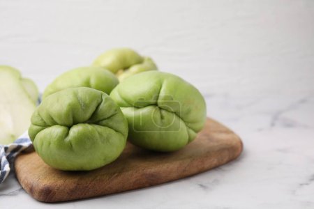 Photo for Fresh green chayote on light table, closeup - Royalty Free Image