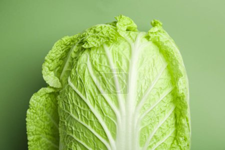 Fresh ripe Chinese cabbage on pale green background, top view