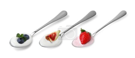 Different delicious yogurts in spoons isolated on white, set