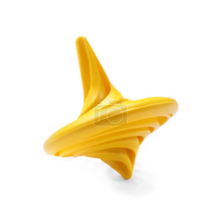 One yellow spinning top on white background