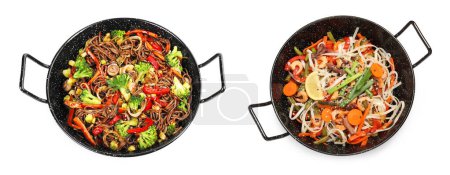 Woks with stir fried noodles and vegetables isolated on white, top view