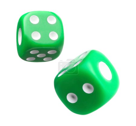 Green dice in air on white background