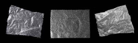 Transparent bubble wraps on black background, top view