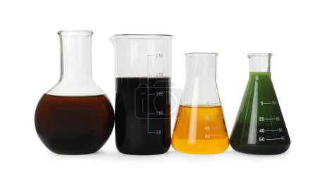 Photo for Laboratory glassware with different types of crude oil isolated on white - Royalty Free Image