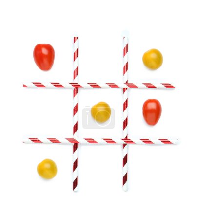 Tic tac toe game made with cherry tomatoes isolated on white, top view