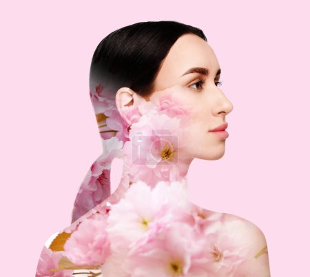 Photo for Double exposure of beautiful woman and blooming flowers on light pink background - Royalty Free Image