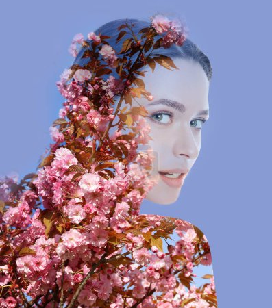 Photo for Double exposure of beautiful woman and blooming flowers on blue background - Royalty Free Image
