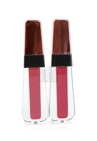 Foto de Dos glosas de labios aislados en blanco. Productos cosméticos - Imagen libre de derechos