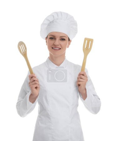 Happy woman chef in uniform holding wooden spatulas on white background