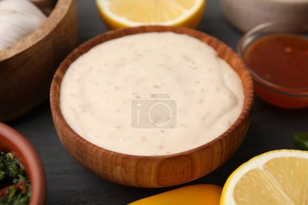 Fresh marinade in bowl on grey table, closeup