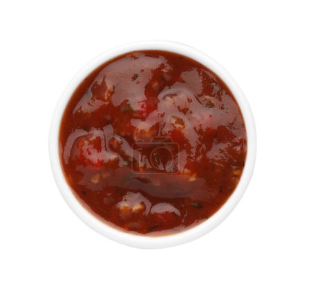 Tasty tomato sauce in bowl isolated on white, top view