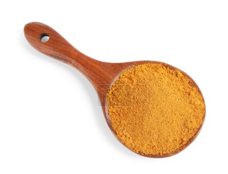 Curry powder in spoon isolated on white, top view