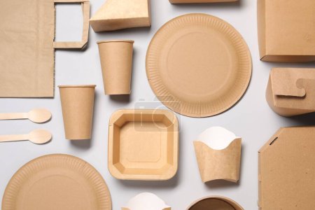 Flat lay composition with eco friendly food packagings on light grey background
