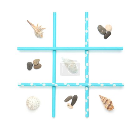 Photo for Tic tac toe game made with sea treasures isolated on white, top view - Royalty Free Image